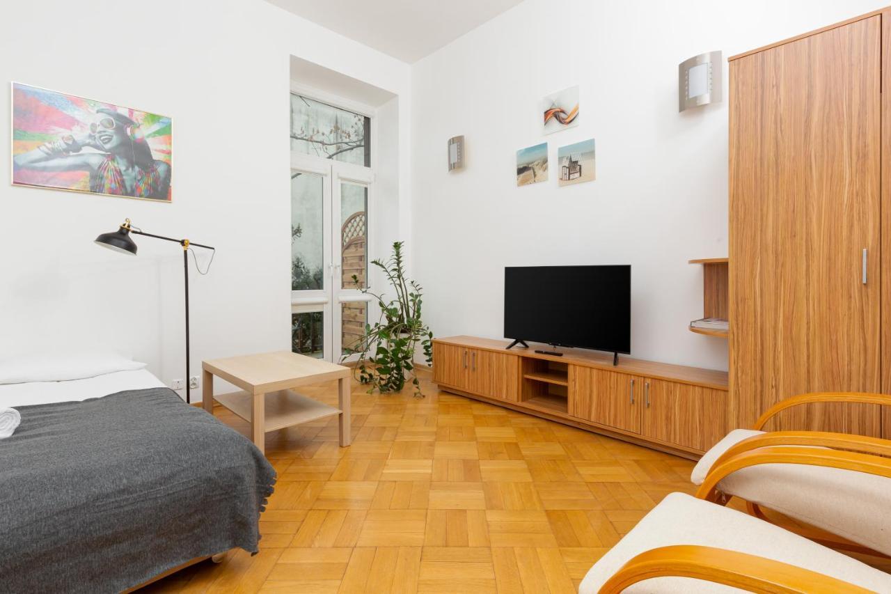 Downtown Studio Apartment By The Park By Noclegi Renters Warschau Exterior foto